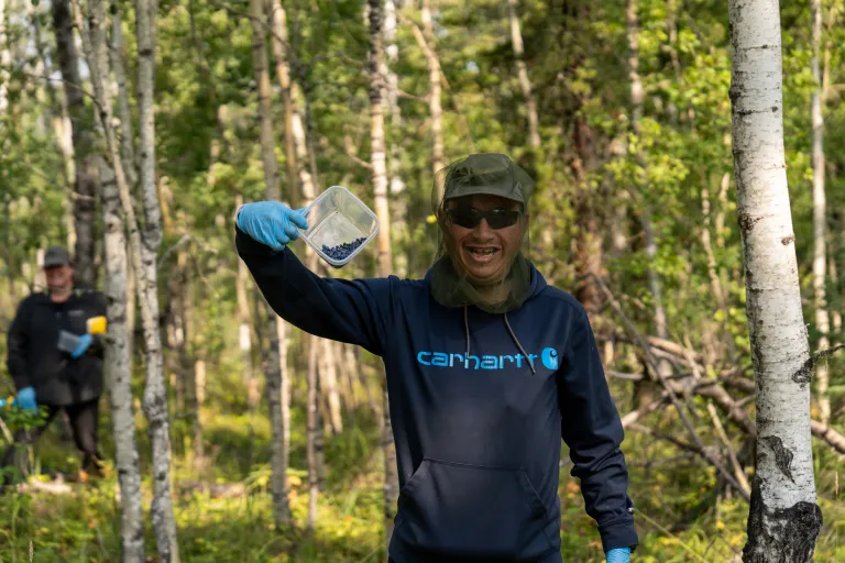 Dale Conklin (Métis) with his blueberry collection